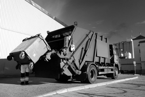 Professional office clearance team removing furniture in Gunnersbury