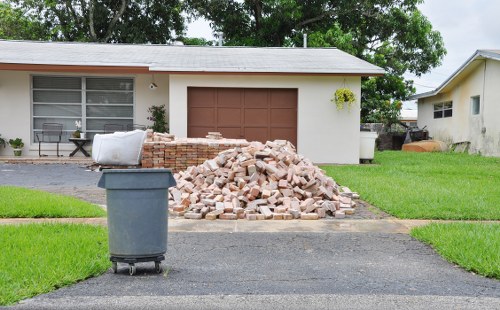 Recycling bins and sorted waste materials