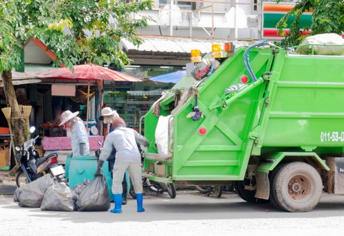 Low-emission van departing with sorted garden clearance materials for processing